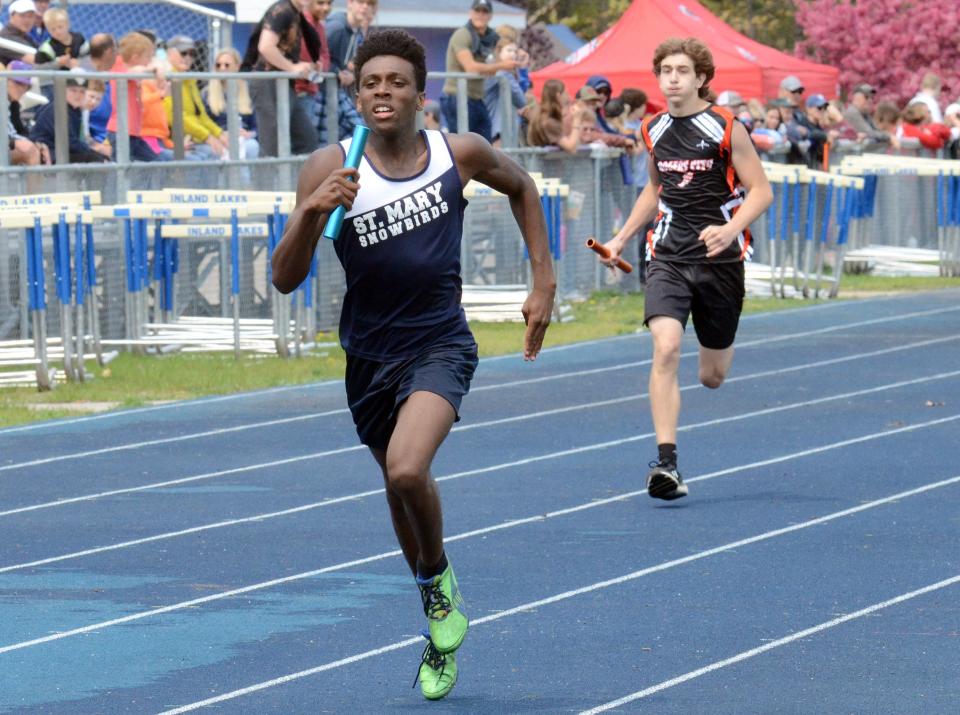 Rylan Matelski runs in the 4x200-meter relay during last season's MHSAA Region 31-4 track meet.