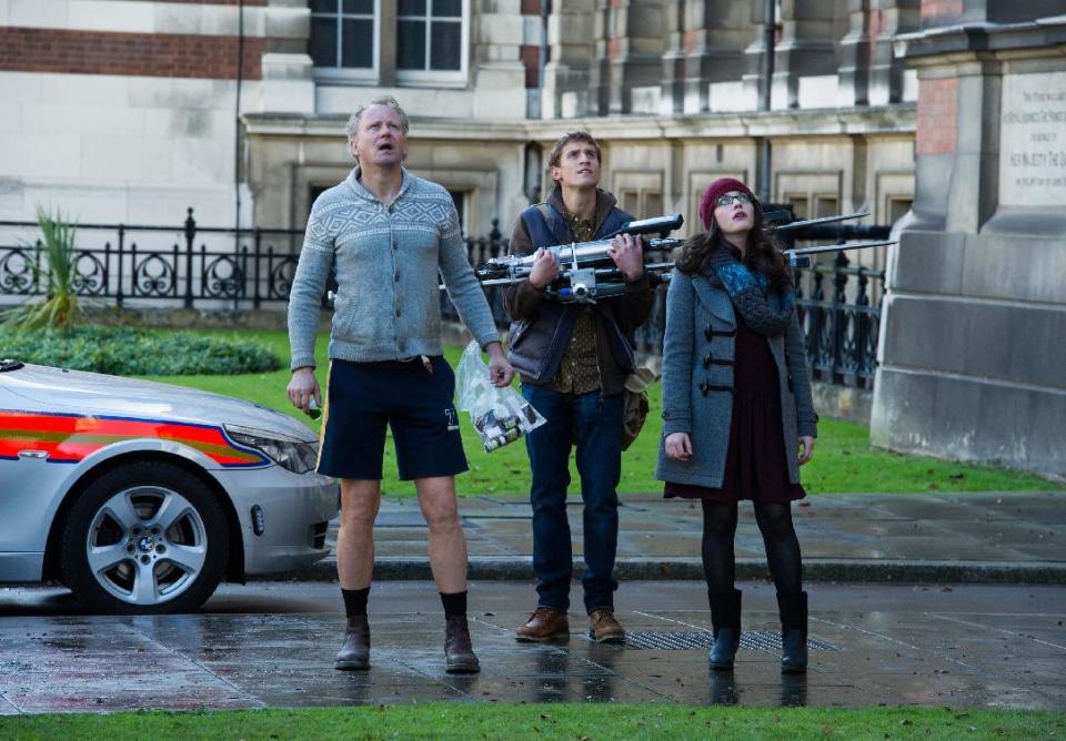 This publicity photo released by Walt Disney Studios and Marvel shows, from left, Stellan Skarsgard, Jonathan Howard, and Kat Dennings in a scene from "Thor: The Dark World." (AP Photo/Walt Disney Studios/Marvel, Jay Maidment)
