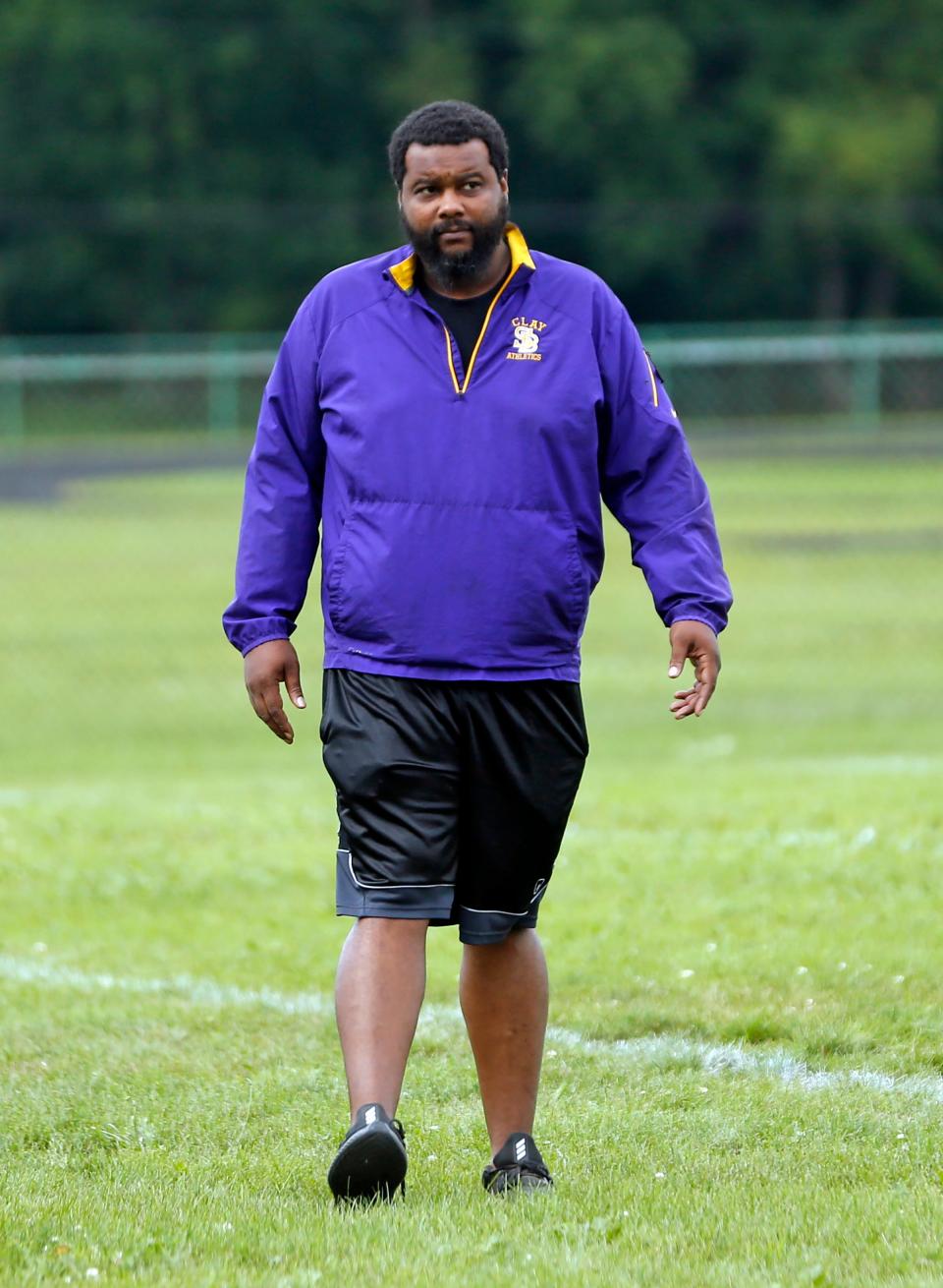 South Bend Clay football coach Darius Mitchell looks on during practice Monday, August 7, 2023, at Clay High School in South Bend.