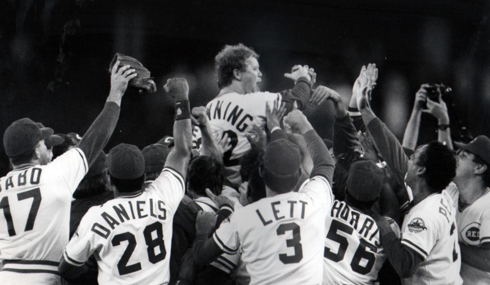 The Reds sweep pitcher Tom Browning off his feet after striking out the Dodgers' Tracy Woodson for the final out of his 1-0 perfect game on Sept. 16, 1988.