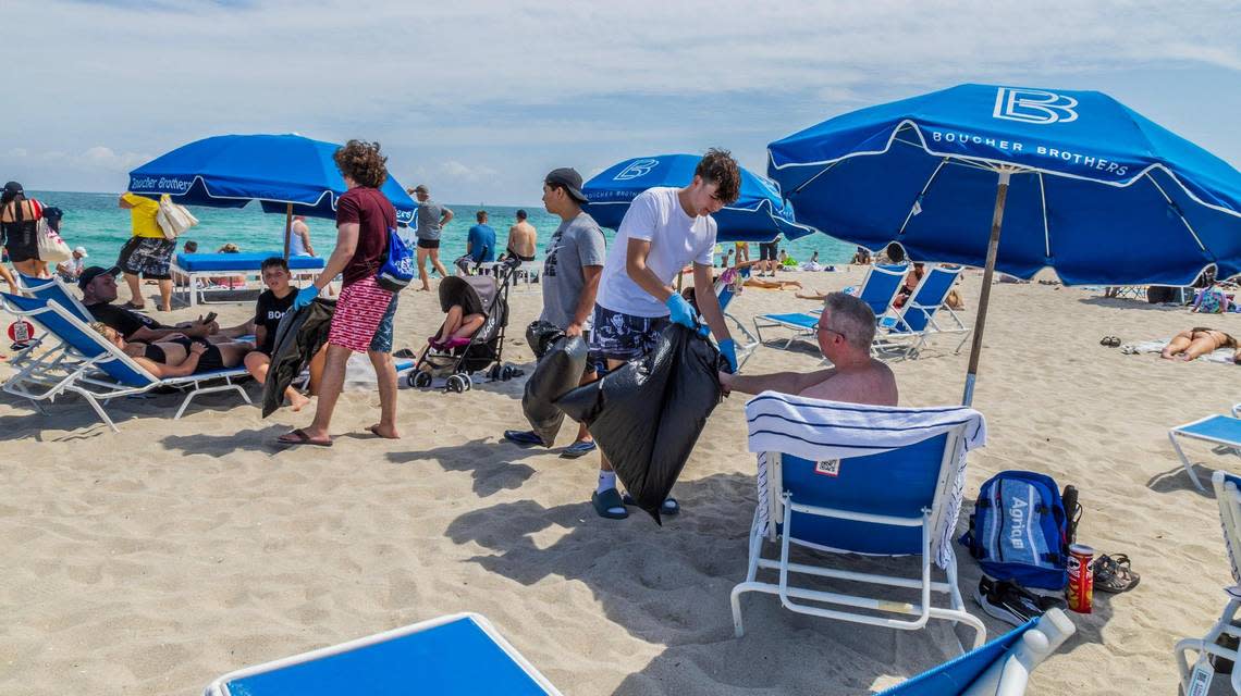 Students from different Miami-Dade County schools including Aisar Hernandez, from the Terra Environmental Research Institute, organized by themselves to voluntarily pick trash along South Beach, during spring break in Miami Beach, on Saturday March 16, 2024.