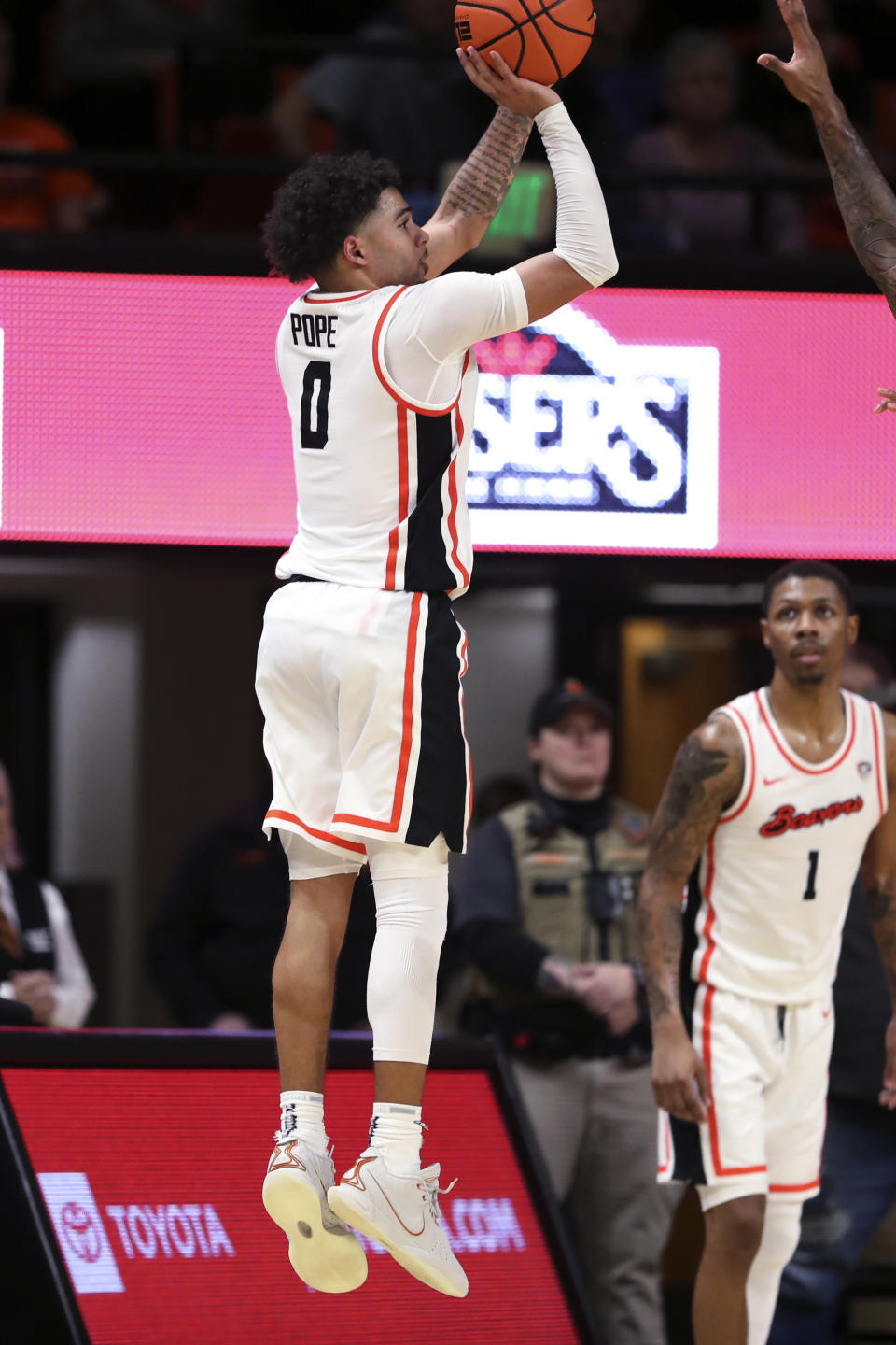 Oregon State guard Jordan Pope shoots a 3-pointer against Arizona at the buzzer in an NCAA college basketball game Thursday, Jan. 25, 2024, in Corvallis, Ore. Oregon State won 83-80. (AP Photo/Amanda Loman)