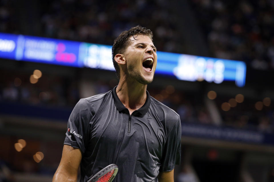 Dominic Thiem, of Austria, reacts after losing a point to Rafael Nadal, of Spain, during the quarterfinals of the U.S. Open tennis tournament, Tuesday, Sept. 4, 2018, in New York. (AP Photo/Jason DeCrow)