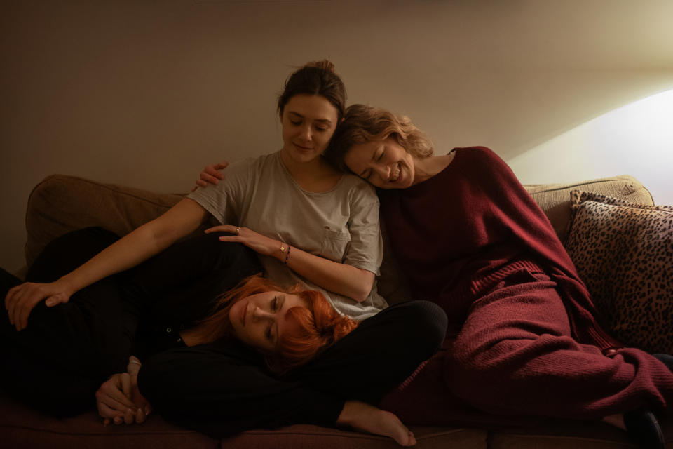 Natasha Lyonne as Rachel, Elizabeth Olsen as Christina and Carrie Coon as Katie in His Three Daughters. (Netflix)