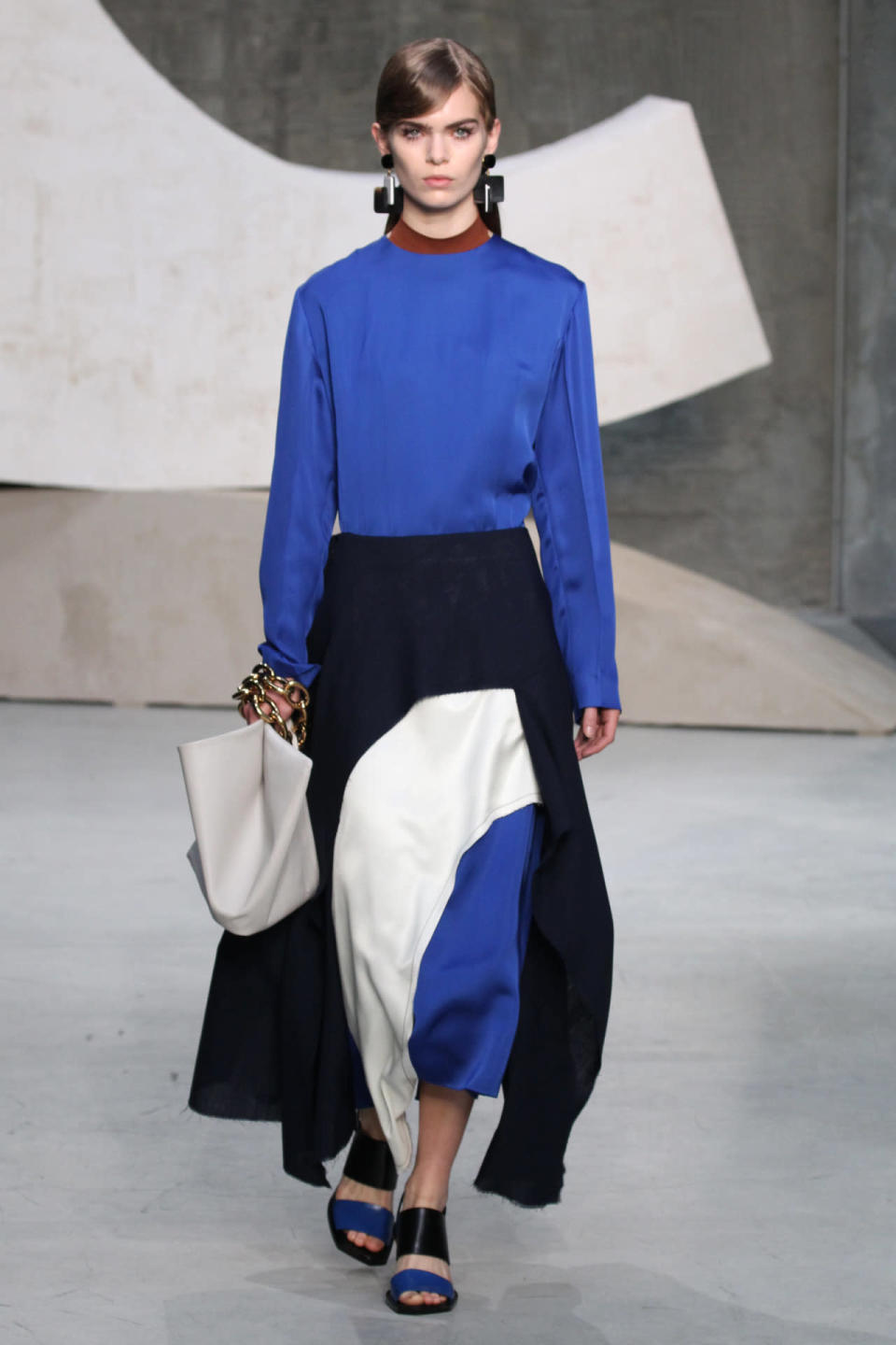 A model wears a triple-layered look at Marni’s spring 2016 show in Milan. (Photo: Getty Images.)