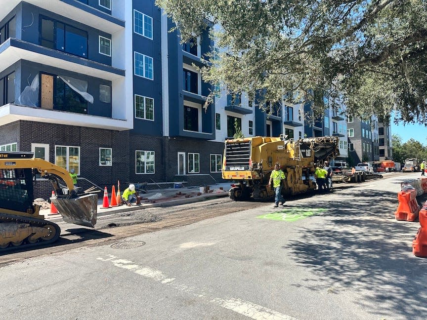 Construction crews can be seen working outside the UFORA Gainesville apartments on Wednesday afternoon near the University of Florida campus.