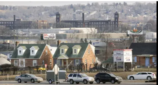 About a decade ago, these residences marked this neighborhood, southeast of the intersection of Interstate 83 and Route 30. They were pulled down to make way for a commercial district.