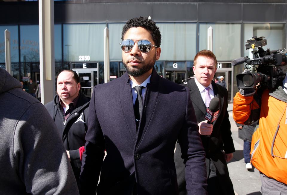 Jussie Smollett leaves the courthouse in Chicago after charges of lying to police were dropped on March 26, 2019.