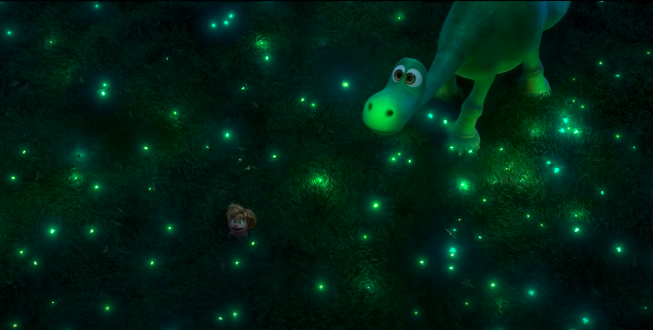 Spot and Arlo in a field surrounded by fireflies