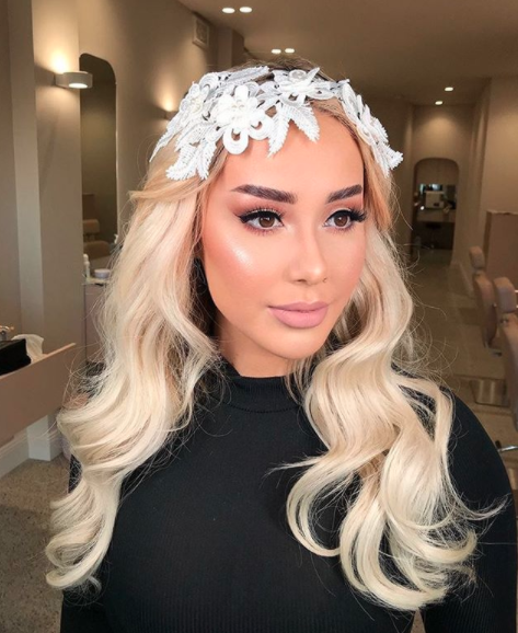 Fans barely recognised Cathy in this bridal makeover snap. Photo: Instagram/summertanx
