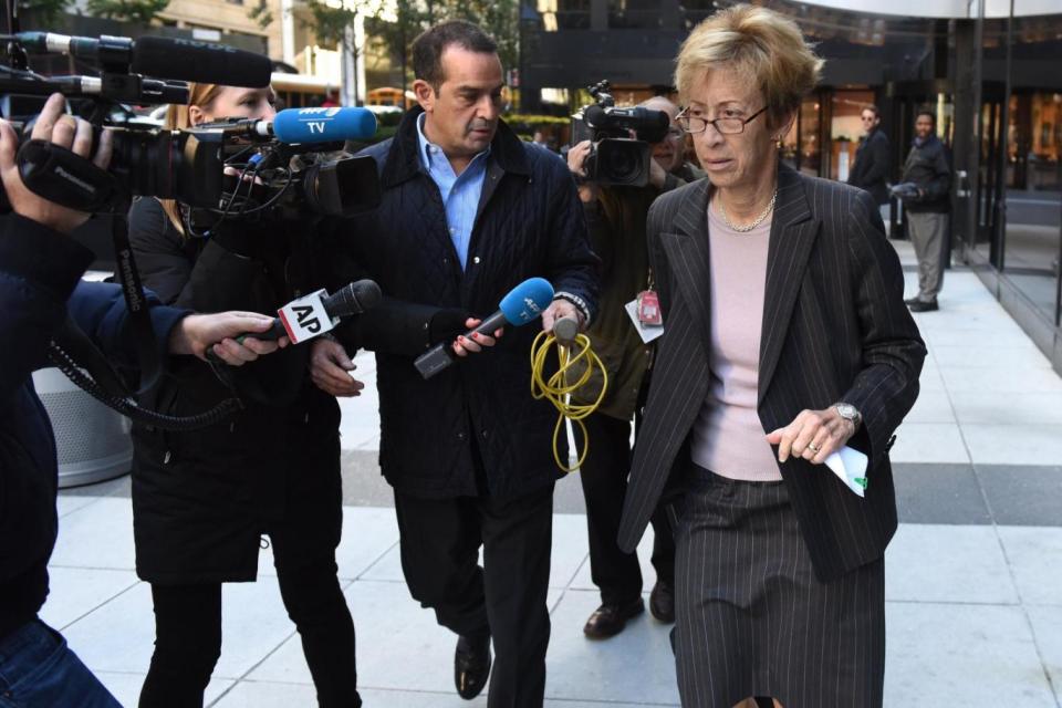 Harvey Weinstein's civil lawyer, Patty Glaser, is surrounded by media after leaving The Weinstein Company Board of Directors meeting in midtown New York. (AFP/Getty Images)