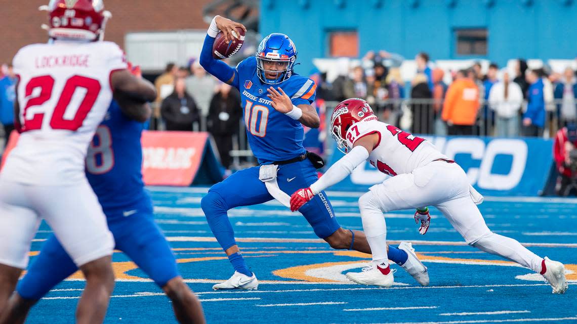 Boise State quarterback Taylen Green keeps the ball in the third quarter of the Mountain West Championship game against Fresno State held on Saturday, Dec. 3, 2022 at Albertsons Stadium. Fresno won 28-16.