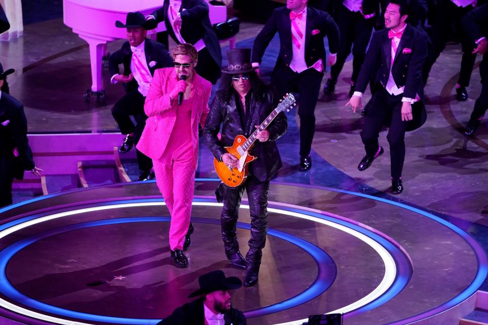 Ryan Gosling performs a gonzo version of “I’m Just Ken” from “Barbie” with Slash during the 96th Oscars.
