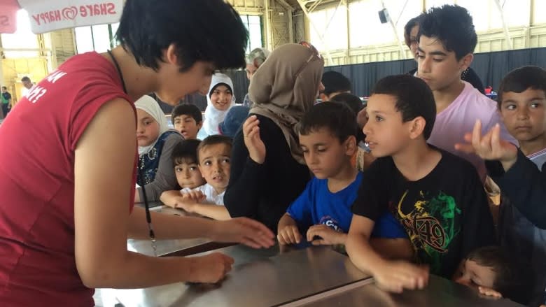 Ottawa hosts welcome party for Syrian refugees at Lansdowne Park