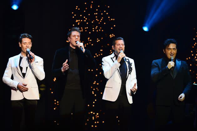Carlos (right) on stage with Il Divo in 2019 (Photo: Johnny Louis via Getty Images)