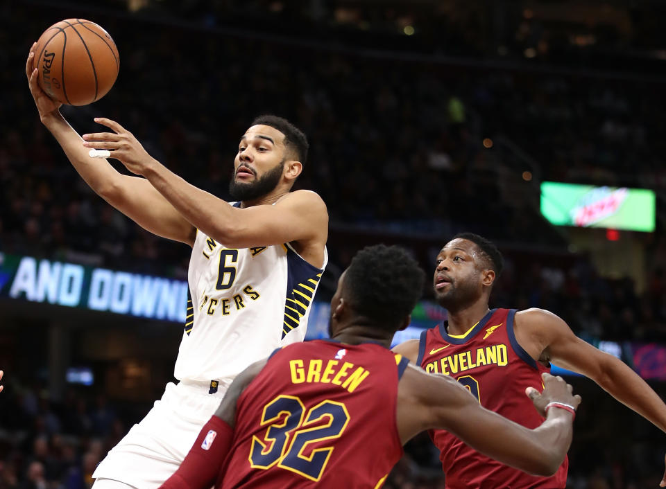 Dwyane Wade and Jeff Green watch as Cory Joseph shows just how unafraid of the Cavs he really is. (Getty)