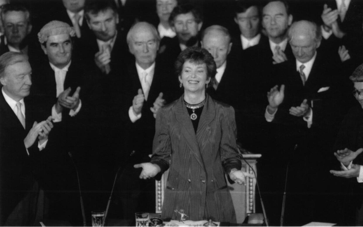 John Murray, second left, next to Charles Haughey, with Mary Robinson in 1990 after she had taken the oath as president of the Irish Republic - Maxwells