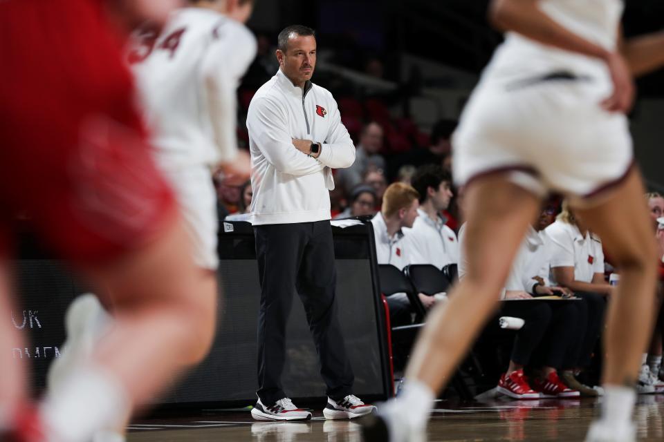 U of L head coach Jeff Walz watched his team in action against Bellarmine during their game at Freedom Hall in Louisville, Ky. on Dec. 14, 2022.  