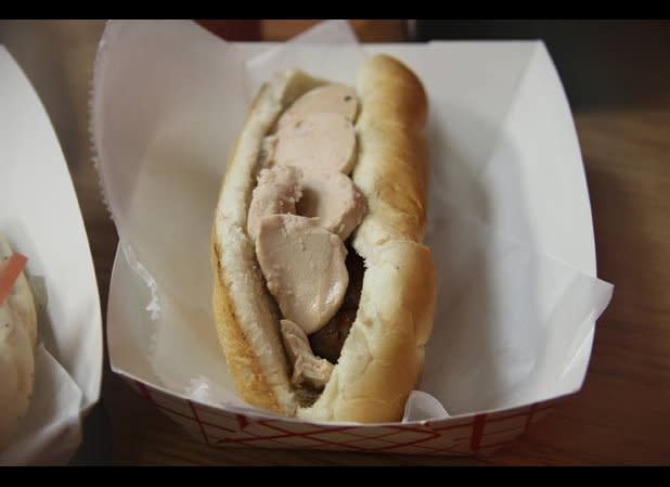<p>When Hot Doug&rsquo;s first opened at its original location in Roscoe Village in 2001, there were people who doubted its owner Doug Sohn&rsquo;s vision of a menu limited to hot dogs and sausages &mdash; even Sohn&rsquo;s own family. "My brother told me, 'Don&rsquo;t you think you&rsquo;ll have to sell hamburgers?'" Sohn related in an interview, adding, "I have it on very good authority that the people at Vienna gave me a few months. They came in and they were like, 'Well, this isn&rsquo;t gonna last.'" Now? Along with Doughnut Vault, Hot Doug&rsquo;s is probably Chicago&rsquo;s most famous line for food, and the entire city let out a collective audible gasp when word spread earlier this month that it would be closing its doors for good in October. <br /> While its main menu is delicious, its items can be replicated elsewhere. The specials&rsquo; flavors and ingredients, however, differentiate Hot Doug&rsquo;s. The normal menu ranges in price from $2 to $4 per order and the special sausages are $6 to $10. It is the type of place where you extend yourself monetarily and calorically because you don&rsquo;t know when the next time will be that you will be able to carve out hours for lunch on a weekday or Saturday to soak up the experience. The signature order here of course, is the foie gras and sauternes duck sausage with truffle aioli, which garnered quite a bit of press in 2006 following the banning of foie in Chicago. Defying the ban pushed by chef Charlie Trotter and Alderman Joe Moore, Sohn named the dog after Moore, was fined, but was ultimately victorious when the ban was repealed in 2008. It&rsquo;s a brilliant pairing &mdash; the snap of the dog against the creaminess of the foie &mdash; a visionary move celebrated by gout-defying offal lovers everywhere. While we&rsquo;ll miss Hot Doug&rsquo;s, we&rsquo;re sure that wherever Sohn ends up next, Chicagoans will be lining up behind him. <br /> <em>Photo Credit: Arthur Bovino </em></p>
