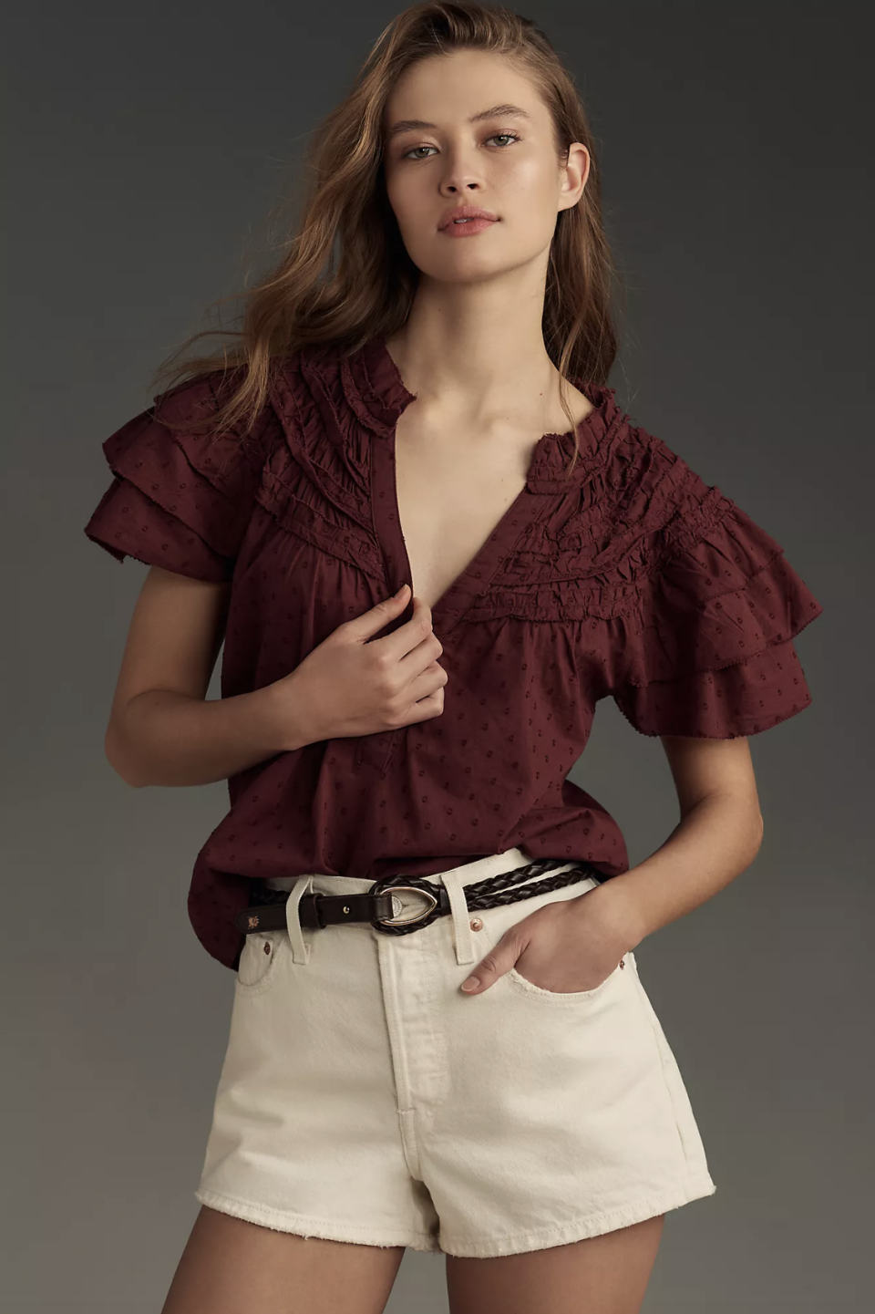 By Anthropologie Layered-Sleeve Henley Top (Photo via Anthropologie)