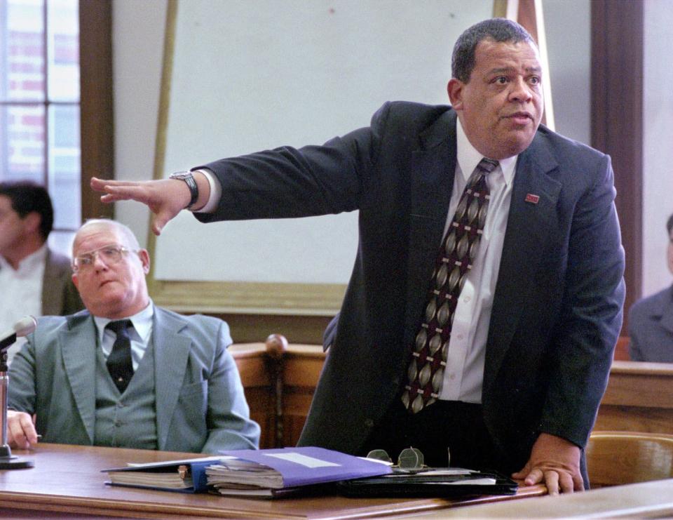 David Baugh, a lawyer defending Barry Black, left, of Johnstown, Pa., on behalf of the ACLU of Virginia, is shown during a hearing in the Carroll County courthouse in Hillsville, Va., on Nov. 13, 1998. Black, a Ku Klux Klan grand dragon, was charged on August 22, 1998, with burning a cross during a Klan meeting on private land. An all-white Virginia jury convicted Black of cross-burning, despite appeals by his lawyer that he was only expressing free speech during a rally.