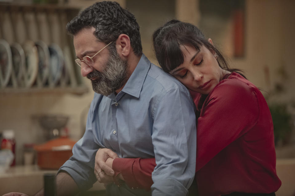 This photo released by Netflix shows characters from the Arabic-language version of the Italian film “Perfect Strangers,” about friends who agree to share their incoming calls, voice and text messages with each other over a dinner party, leading to a series of revelations that test their marriages and friendships. The film’s release has led to a widespread debate in some Arabic-speaking societies, such as Egypt, where some have denounced it as a threat to family and religious values while others praised and defended it.(Rudy Bou Chebel/Netflix via AP)