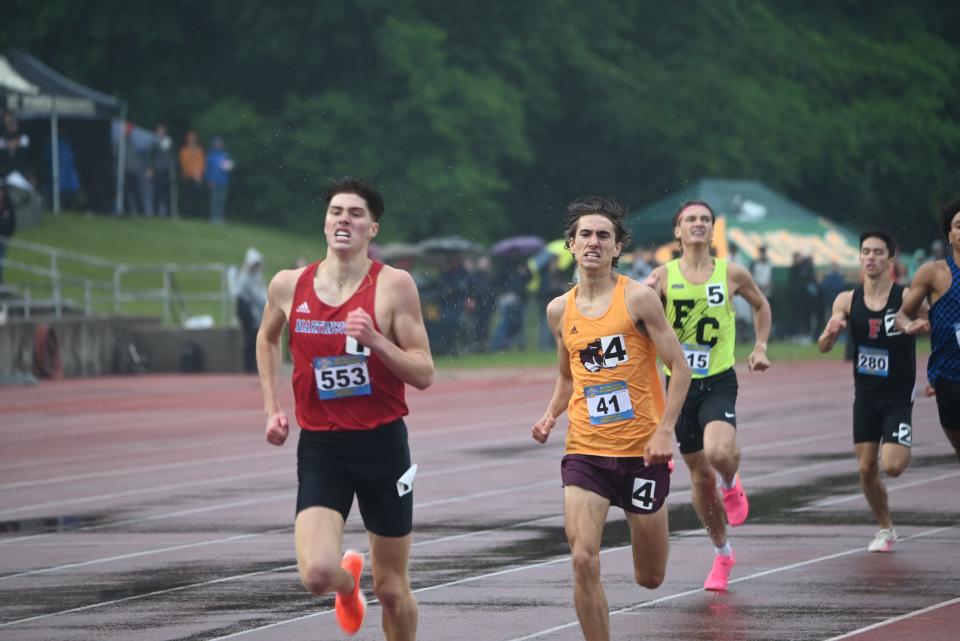 Bloomington North’s Caleb Winders chases Martinsville's Martin Barco during the 800m race during the IHSAA Boys State Track & Field Finals at the Robert C. Haugh Track & Field Complex on the campus of Indiana University in Bloomington on Saturday, June 1, 2024.