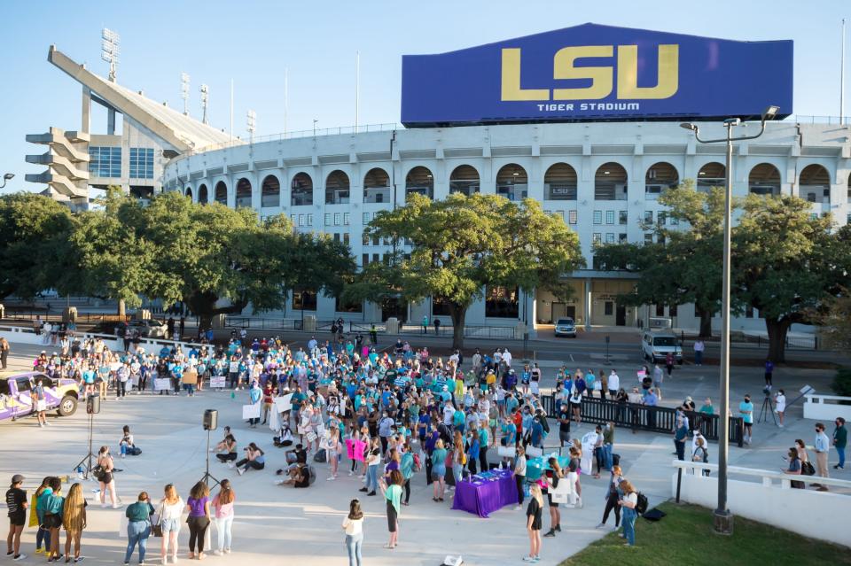 Protesters march on the LSU campus Nov. 20, 2020, in reaction to the way officials handled rape and abuse allegations against football players.