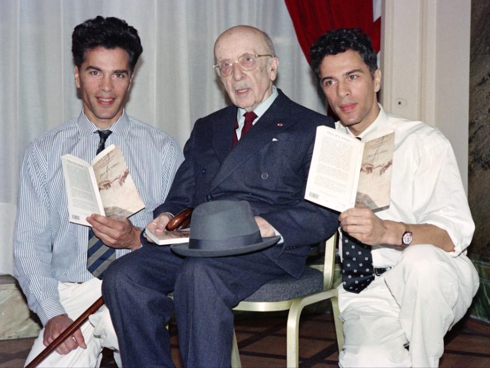 Igor and Grichka Bogdanoff with French writer and philosopher Jean Guitton on 6 September 1991 in Paris, France (MICHEL GANGNE/AFP via Getty Images)