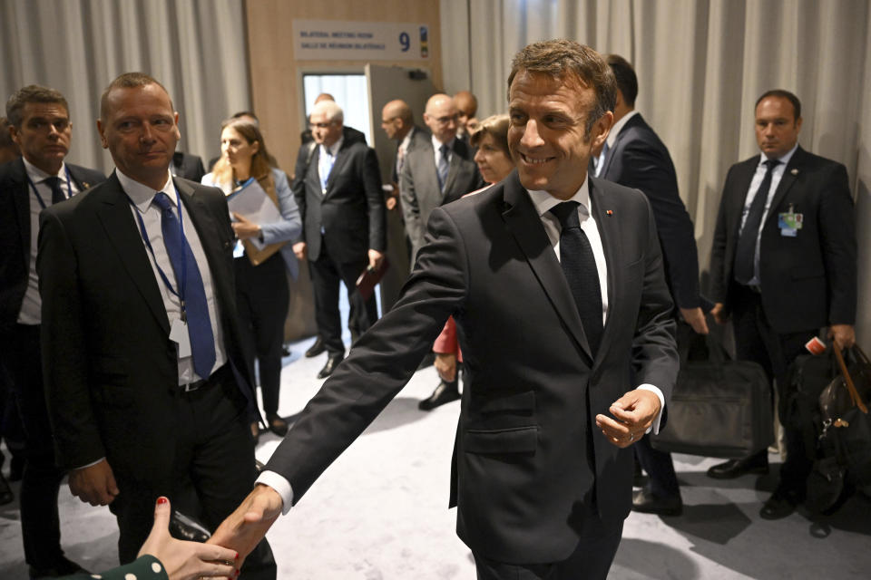 French President Emmanuel Macron arrives to attend the NATO Summit in Vilnius, Lithuania, Tuesday July 11, 2023. (Paul Ellis/Pool Photo via AP)