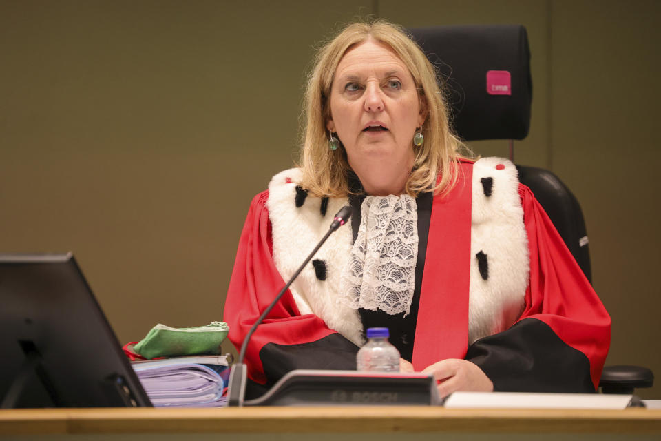 Chairwoman of the court Laurence Massart during the start of the trial for the Brussels attacks, that took place on March 22, 2016, at the Justitia building in Brussels, Monday, Dec. 5, 2022. More than six years later, ten defendants face charges including murder, attempted murder and membership, or participation in the acts of a terrorist group, over the morning rush hour attacks at Belgium's main airport and on the central commuter line on March, 22, 2016. (AP Photo/Olivier Matthys, Pool)