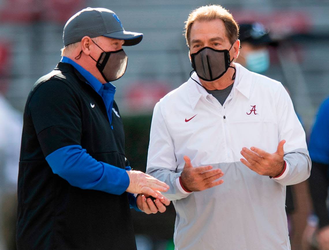 Kentucky coach Mark Stoops, left, and now former Alabama coach Nick Saban spoke before the Wildcats played the Crimson Tide in 2020, “the pandemic season” of college football. Saban, who announced his retirement as Bama coach Wednesday, never lost to UK, going 6-0 vs. the Wildcats as Alabama coach and 3-0 as LSU head man.