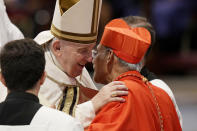 New CardinalFilipe Neri Antonio Sebastiao Do Rosario Ferrao receives the red three-cornered biretta hat from Pope Francis during a consistory inside St. Peter's Basilica, at the Vatican, Saturday, Aug. 27, 2022. Pope Francis has chosen 20 men to become the Catholic Church's newest cardinals. (AP Photo/Andrew Medichini)