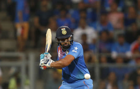 Cricket - West Indies v India - World Twenty20 cricket tournament semi-final - Mumbai, India - 31/03/2016. India's Rohit Sharma plays a shot. REUTERS/Danish Siddiqui