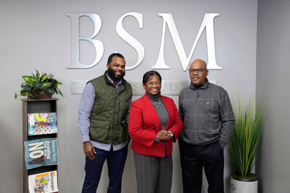 Buckner and Sons Masonry owners Otis and Bailene Buckner along with their son Otis Jerome Buckner pose for inside their Hilltop business on February 10, 2022. 