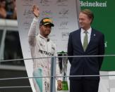 Formula One - F1 - Italian Grand Prix 2016 - Autodromo Nazionale Monza, Monza, Italy - 4/9/16 Mercedes' Lewis Hamilton celebrates second place on the podium Reuters / Max Rossi Livepic