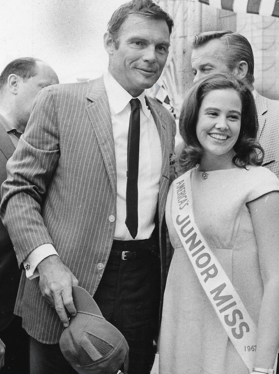 “Batman” star Adam West chats with America’s Junior Miss Rosemary Dunaway during Soap Box Derby activities Aug. 18, 1967, in Akron.