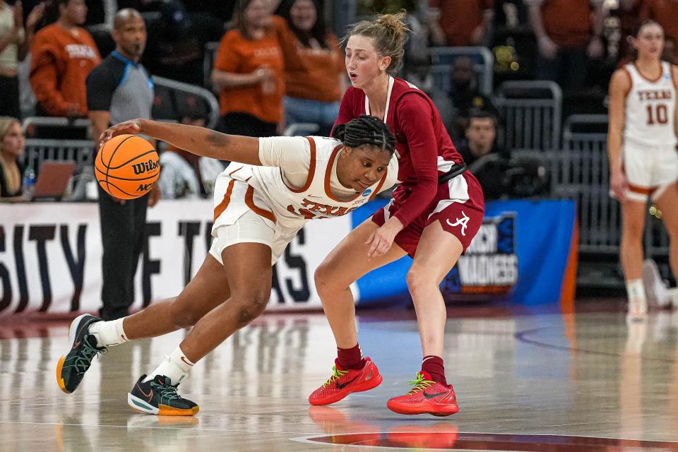 Texas freshman point guard Madison Booker scored 21 points in Sunday's 65-54 NCAA Tournament win over Alabama at Moody Center, but the Longhorns' dominance in the lane was the difference in the game.