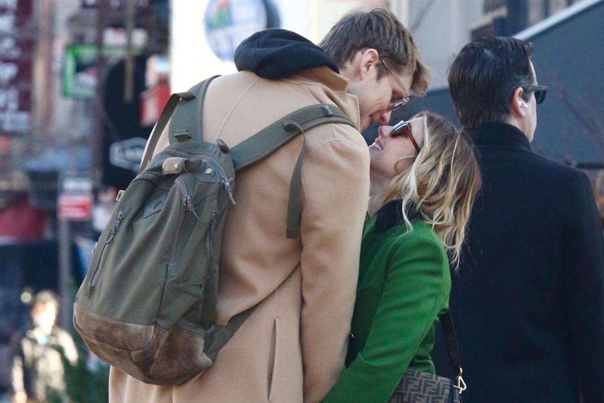 *EXCLUSIVE* - Actress Emma Roberts and her boyfriend Cody John are all smiles as they hold hands and kiss during a romantic PDA-filled moment in Manhattan’s Downtown area