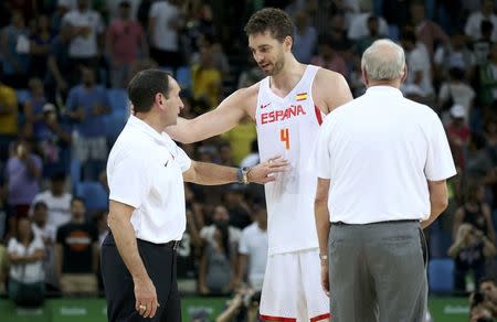 2016 Rio Olympics - Basketball - Semifinal - Men's Semifinal Spain v USA - Carioca Arena 1 - Rio de Janeiro, Brazil - 19/8/2016. Pau Gasol (ESP) of Spain talks with coach Mike Krzyzewski (USA) of the USA after the game. REUTERS/Shannon Stapleton