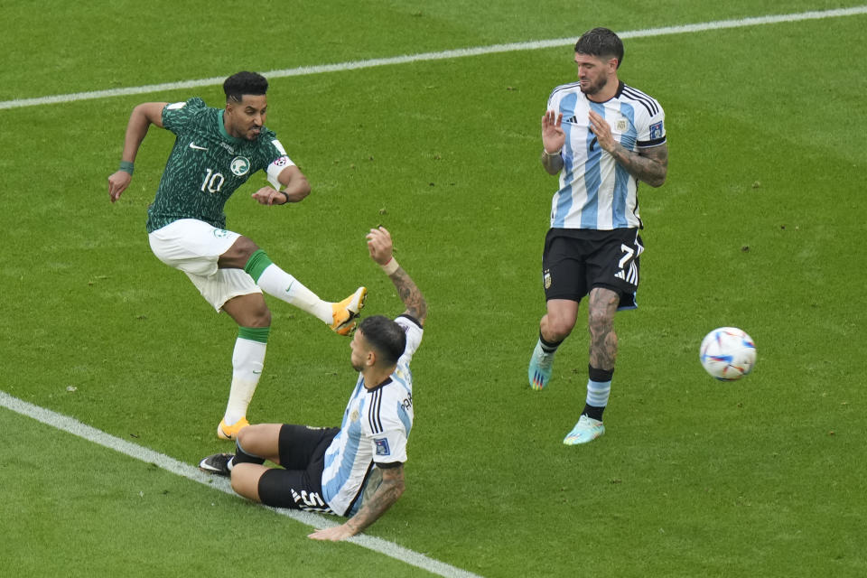 FILE - Saudi Arabia's Salem Al-Dawsari scores his side's second goal during the World Cup group C soccer match between Argentina and Saudi Arabia at the Lusail Stadium in Lusail, Qatar, Tuesday, Nov. 22, 2022. (AP Photo/Luca Bruno, File)