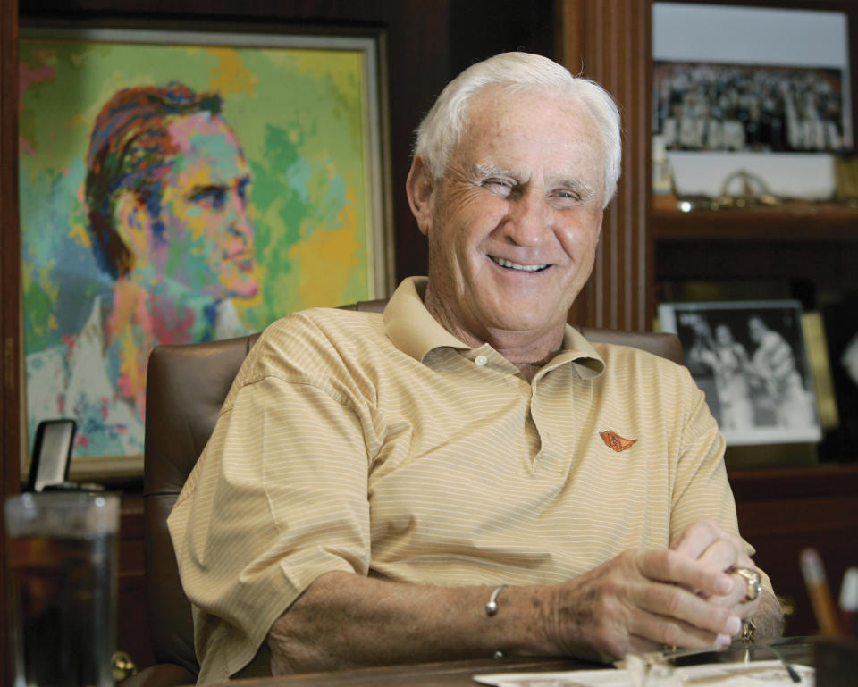 FILE- Former Miami Dolphins head coach Don Shula smiles during an interview at his home in Indian Creek, Fla., Nov. 8, 2007. Shula was an NFL coach for 33 years and won a record 347 games. That includes 17 victories in 1972, when Shula's Miami Dolphins achieved the league's lone perfect season. (AP Photo/Wilfredo Lee, File)