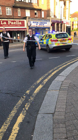 Police officers are seen after a minor explosion was reported at Southgate underground station, London, Britain June 19 2018, in this picture obtained from social media. Deborah Pratchett/ via REUTERS