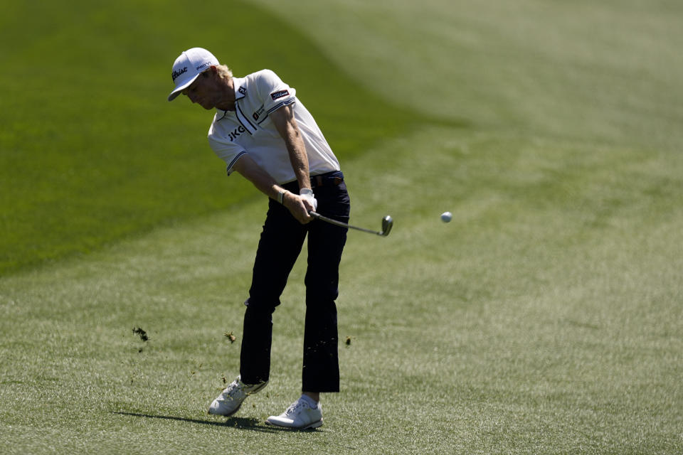 Will Zalatoris hits from the fairway on the 13th hole during a practice round for the Masters golf tournament on Monday, April 5, 2021, in Augusta, Ga. (AP Photo/Charlie Riedel)