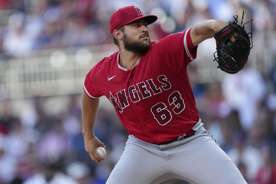 Los Angeles Angels starting pitcher Chase Silseth works against the Atlanta Braves in the first inning of a baseball game Monday, July 31, 2023, in Atlanta. (AP Photo/John Bazemore)