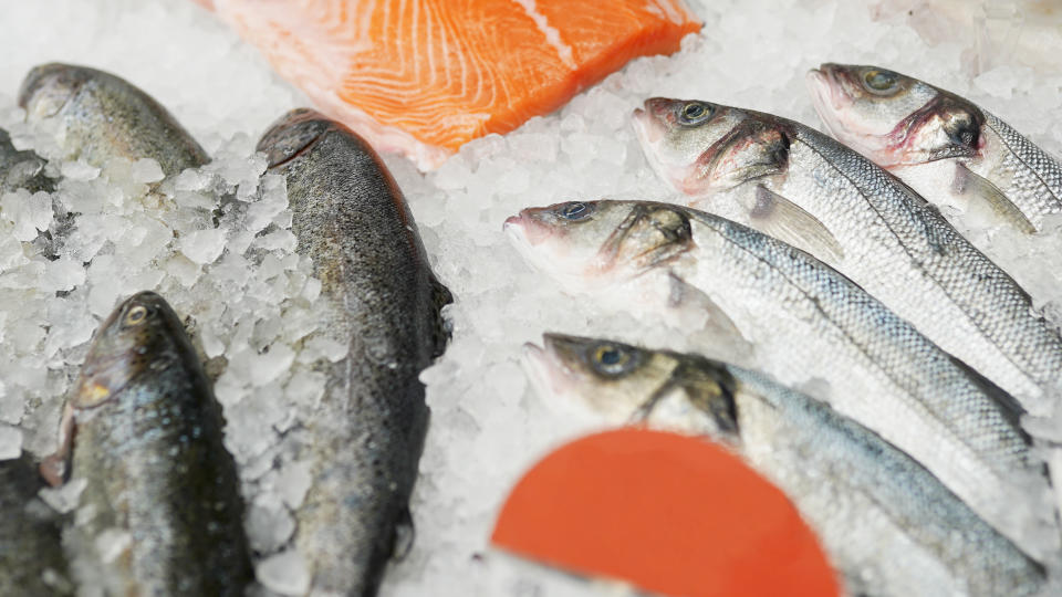 A 22-year-old man may have caught coronavirus while cleaning frozen seafood. 