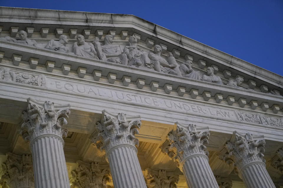 Light illuminates part of the Supreme Court building on Capitol Hill in Washington, Wednesday, Nov. 16, 2022. (AP Photo/Patrick Semansky)