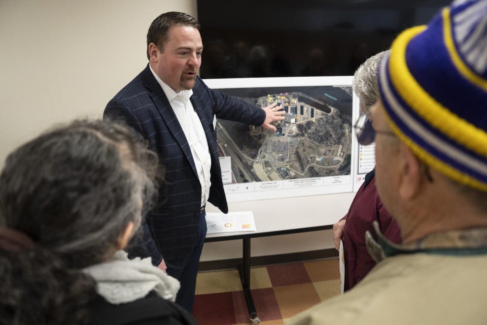 Xcel Energy regional vice president John Marshall explains the leak to a group of people who live a quarter of a mile from the nuclear power plant who had concerns about their safety during a community meeting in Monticello, Minn., on Friday, March 24, 2023. A leak of what was believed to be hundreds of gallons of water containing tritium was discovered this week from a temporary fix at the Monticello Nuclear Generating Plant, where 400,000 gallons (1.5 million liters) of water with tritium leaked in November, Xcel Energy said in a statement Thursday. (Renee Jones Schneider /Star Tribune via AP)