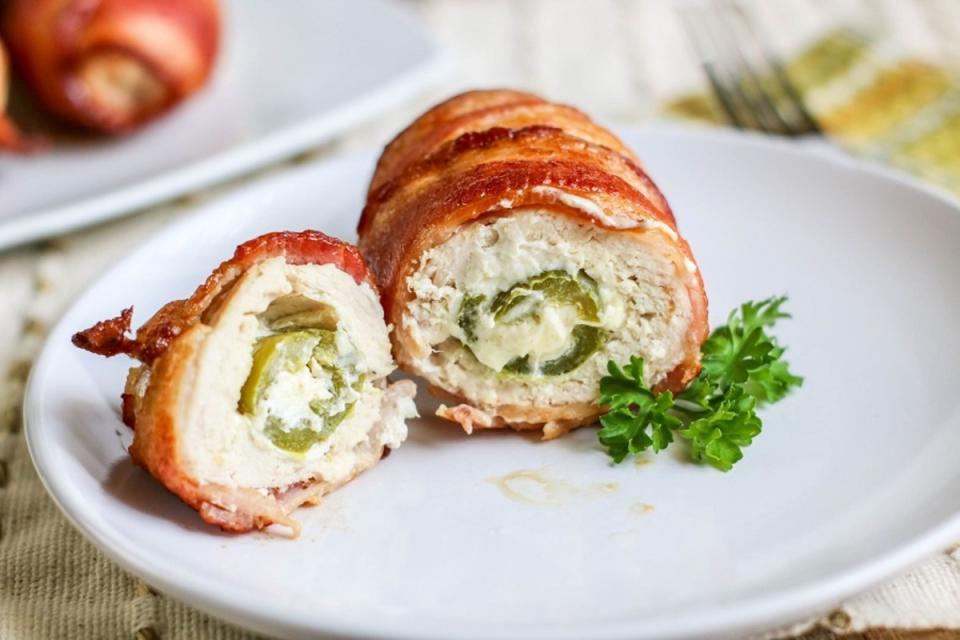 <p>Moore or Less Cooking</p><p>Flavorful Stuffed chicken breast filled with cheesy jalapenos wrapped in crispy bacon.</p><p><strong>Get the recipe: </strong><a href="https://mooreorlesscooking.com/air-fryer-bacon-wrapped-jalapeno-stuffed-chicken/" rel="nofollow noopener" target="_blank" data-ylk="slk:Air Fryer Bacon-Wrapped Jalapeno Stuffed Chicken;elm:context_link;itc:0;sec:content-canvas" class="link "><strong>Air Fryer Bacon-Wrapped Jalapeno Stuffed Chicken</strong></a></p>