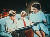 <p>A still from the Queen's Christmas Broadcast, showing her with her sons Prince Andrew (left) and Prince Edward (centre).</p>